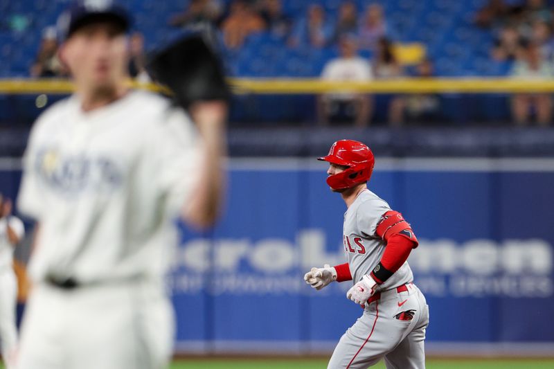 Apr 15, 2024; St. Petersburg, Florida, USA;  Los Angeles Angels Taylor Ward (42) runs the bases after hitting a two run home run against the Tampa Bay Rays in the ninth inning during Jackie Robinson day at Tropicana Field. Mandatory Credit: Nathan Ray Seebeck-USA TODAY Sports