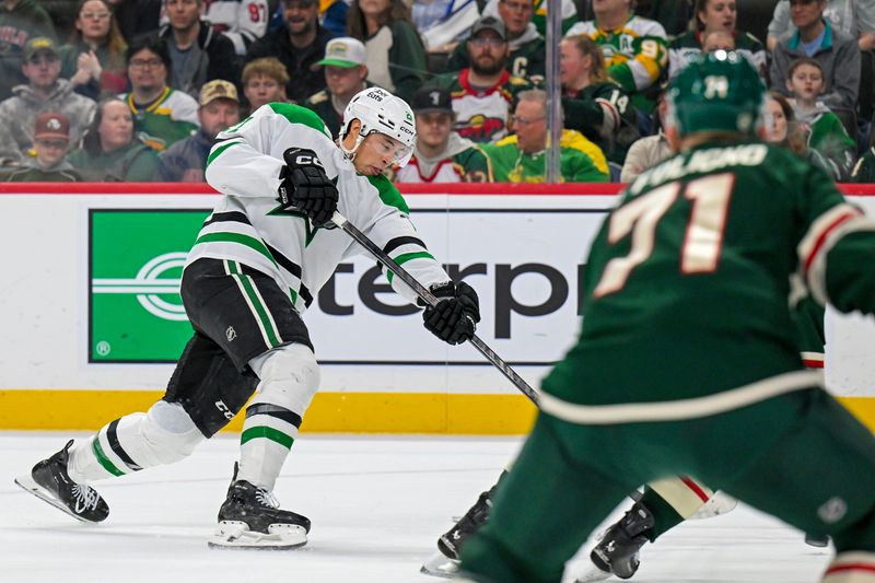 Mar 21, 2026; Saint Paul, Minnesota, USA;  Dallas Stars forward Jason Robertson (21) scores a power play goal against the Minnesota Wild during the first period at Grand Casino Arena. Mandatory Credit: Nick Wosika-Imagn Images