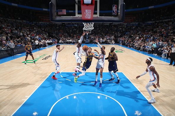 OKLAHOMA CITY, OK - DECEMBER 8: Stephen Curry #30 of the Golden State Warriors drives to the basket during the game against the Oklahoma City Thunder on December 8, 2023 at Paycom Arena in Oklahoma City, Oklahoma. NOTE TO USER: User expressly acknowledges and agrees that, by downloading and or using this photograph, User is consenting to the terms and conditions of the Getty Images License Agreement. Mandatory Copyright Notice: Copyright 2023 NBAE (Photo by Zach Beeker/NBAE via Getty Images)