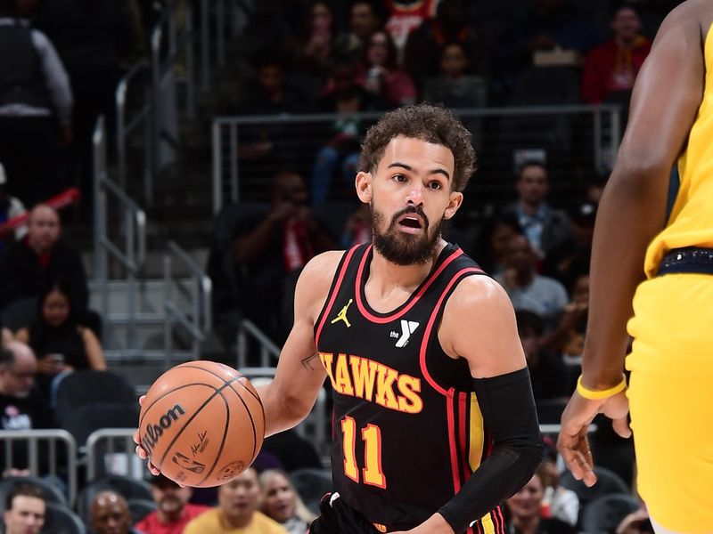 ATLANTA, GA - MARCH 6:  Trae Young #11 of the Atlanta Hawks dribbles the ball during the game against the Indiana Pacers on March 6, 2025 at State Farm Arena in Atlanta, Georgia.  NOTE TO USER: User expressly acknowledges and agrees that, by downloading and/or using this Photograph, user is consenting to the terms and conditions of the Getty Images License Agreement. Mandatory Copyright Notice: Copyright 2025 NBAE (Photo by Scott Cunningham/NBAE via Getty Images)