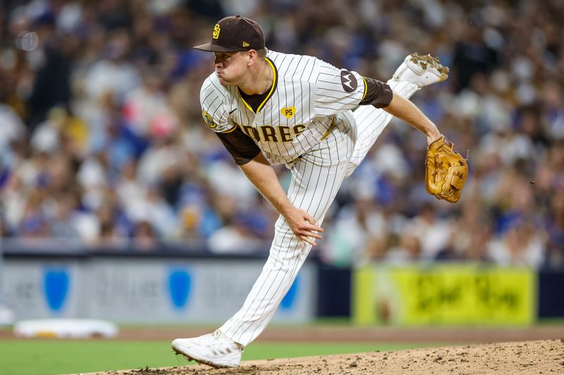 Jul 30, 2024; San Diego, California, USA; San Diego Padres relief pitcher Stephen Kolek (32) throws a pitch during the sixth inning against the Los Angeles Dodgers at Petco Park. Mandatory Credit: David Frerker-USA TODAY Sports