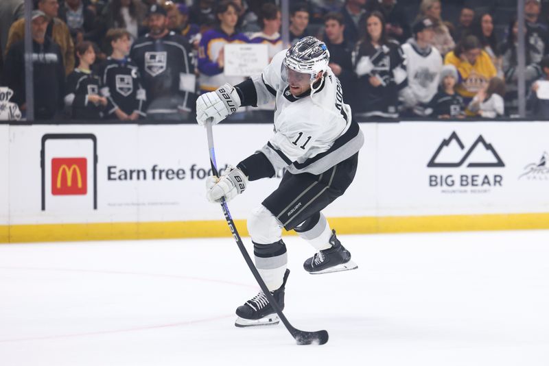 Dec 27, 2023; Los Angeles, California, USA; Los Angeles Kings center Anze Kopitar (11) warms up before a game against the San Jose Sharks at Crypto.com Arena. Mandatory Credit: Jessica Alcheh-USA TODAY Sports