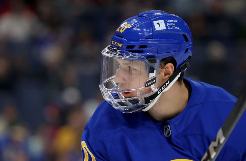Feb 25, 2025; Buffalo, New York, USA;  Buffalo Sabres center Jiri Kulich (20) waits for the face-off during the second period against the Anaheim Ducks at KeyBank Center. Mandatory Credit: Timothy T. Ludwig-Imagn Images
