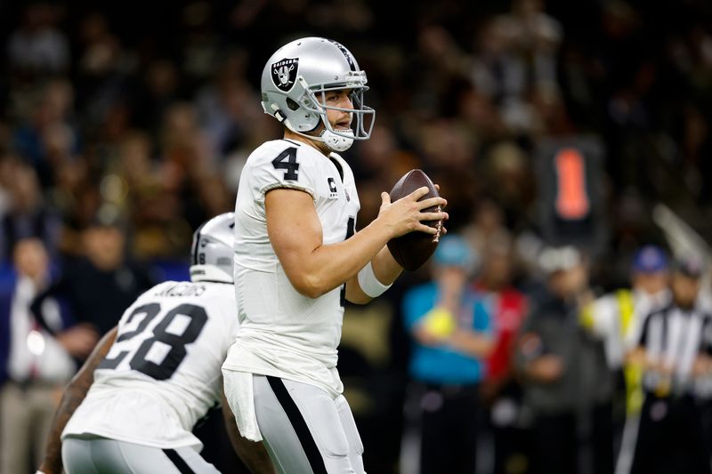 Las Vegas Raiders quarterback Derek Carr (4) during an NFL football game against the New Orleans Saints, Sunday, Oct. 30, 2022, in New Orleans. (AP Photo/Tyler Kaufman)