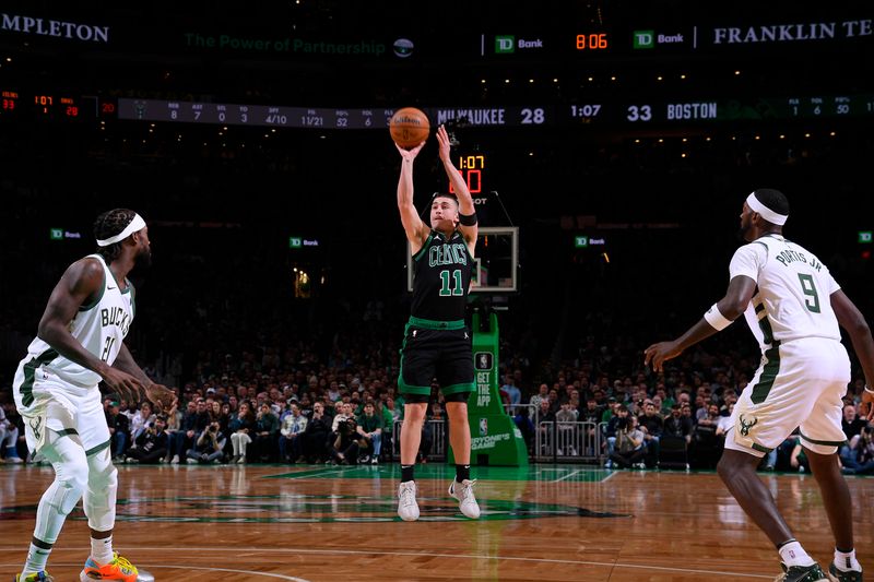 BOSTON, MA - MARCH 20: Payton Pritchard #11 of the Boston Celtics shoots the ball during the game against the Milwaukee Bucks on March 20, 2024 at the TD Garden in Boston, Massachusetts. NOTE TO USER: User expressly acknowledges and agrees that, by downloading and or using this photograph, User is consenting to the terms and conditions of the Getty Images License Agreement. Mandatory Copyright Notice: Copyright 2024 NBAE  (Photo by Brian Babineau/NBAE via Getty Images)