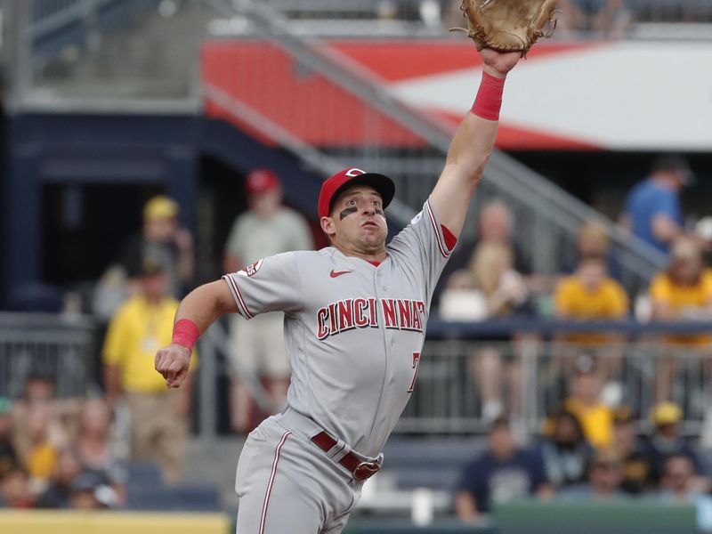 Aug 13, 2023; Pittsburgh, PA, USA; Cincinnati Reds third baseman Spencer Steer (7) reaches for a ball hit by Pittsburgh Pirates right fielder Henry Davis (not pictured) during the fourth inning at PNC Park. Mandatory Credit: Charles LeClaire-USA TODAY Sports