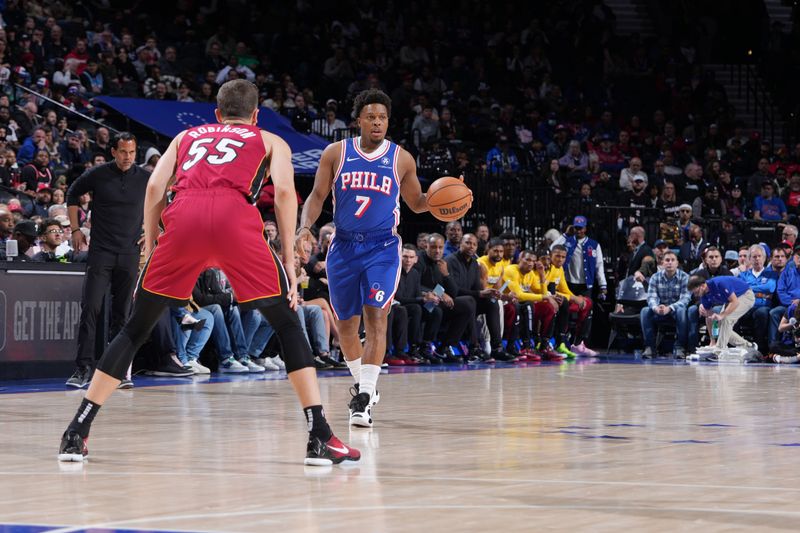 PHILADELPHIA, PA - MARCH 18: Kyle Lowry #7 of the Philadelphia 76ers dribbles the ball during the game against the Miami Heat on March 18, 2024 at the Wells Fargo Center in Philadelphia, Pennsylvania NOTE TO USER: User expressly acknowledges and agrees that, by downloading and/or using this Photograph, user is consenting to the terms and conditions of the Getty Images License Agreement. Mandatory Copyright Notice: Copyright 2024 NBAE (Photo by Jesse D. Garrabrant/NBAE via Getty Images)