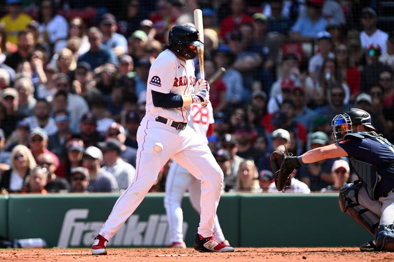 Apr 24, 2025; Boston, Massachusetts, USA; Boston Red Sox first base Triston Casas (36) was hit by a pitch thrown by Seattle Mariners pitcher Bryan Woo (not seen) during the second inning at Fenway Park. Mandatory Credit: Brian Fluharty-Imagn Images