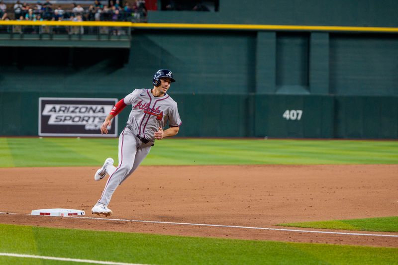 Apr 26, 2025; Phoenix, Arizona, USA;  Atlanta Braves infielder Matt Olson (28) runs to score in the seventh inning against the Arizona Diamondbacks at Chase Field. Mandatory Credit: Allan Henry-Imagn Images
