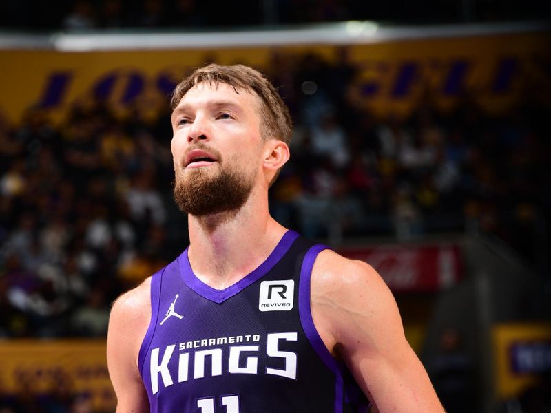 LOS ANGELES, CA - OCTOBER 26: Domantas Sabonis #11 of the Sacramento Kings looks on during the game against the Los Angeles Lakers on October 26, 2024 at Crypto.Com Arena in Los Angeles, California. NOTE TO USER: User expressly acknowledges and agrees that, by downloading and/or using this Photograph, user is consenting to the terms and conditions of the Getty Images License Agreement. Mandatory Copyright Notice: Copyright 2024 NBAE (Photo by Adam Pantozzi/NBAE via Getty Images)