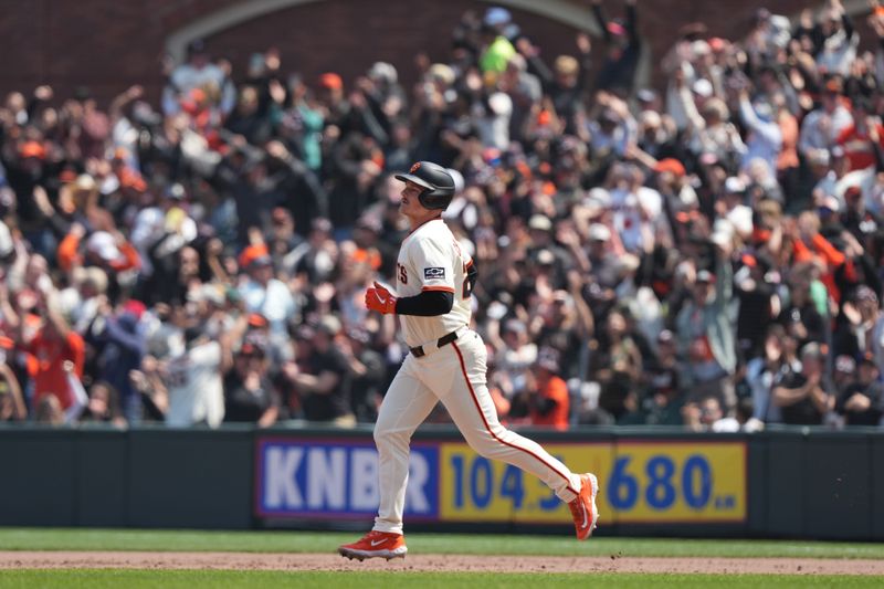 May 3, 2025; San Francisco, California, USA; San Francisco Giants third baseman Matt Chapman (26) rounds the bases after hitting a grand slam home run against the Colorado Rockies during the sixth inning at Oracle Park. Mandatory Credit: Darren Yamashita-Imagn Images