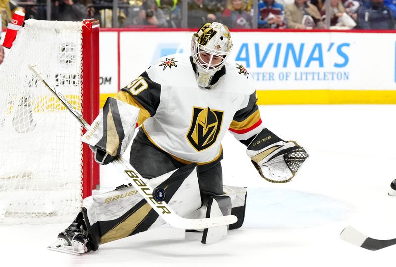 sJan 10, 2024; Denver, Colorado, USA; Vegas Golden Knights goaltender Jiri Patera (30) makes a save in the second period against the Colorado Avalanche at Ball Arena. Mandatory Credit: Ron Chenoy-USA TODAY Sports