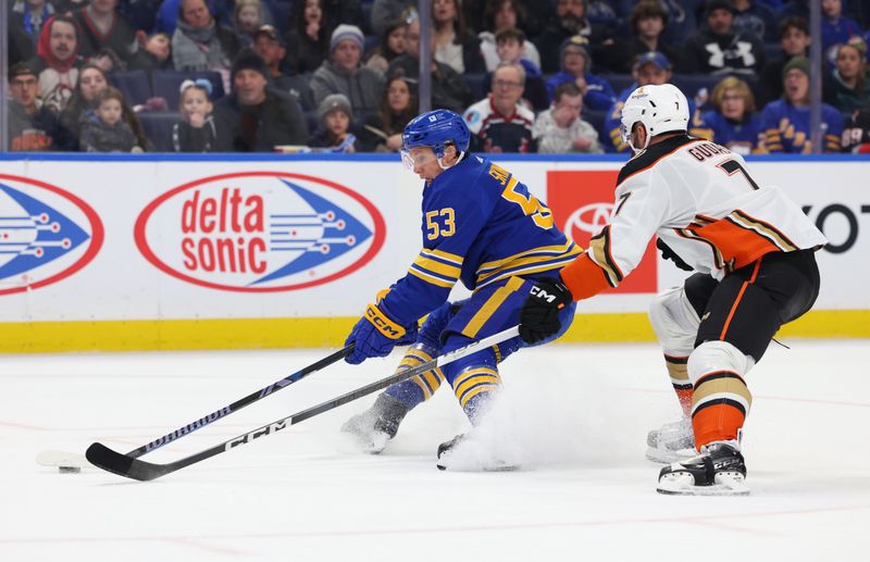 Feb 19, 2024; Buffalo, New York, USA;  Anaheim Ducks defenseman Radko Gudas (7) defends as Buffalo Sabres left wing Jeff Skinner (53) skates with the puck during the second period at KeyBank Center. Mandatory Credit: Timothy T. Ludwig-USA TODAY Sports