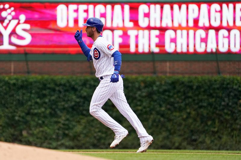 Jul 15, 2023; Chicago, Illinois, USA; Chicago Cubs center fielder Cody Bellinger (24) runs the bases after hitting a grand slam home run against the Boston Red Sox during the third inning at Wrigley Field. Mandatory Credit: David Banks-USA TODAY Sports