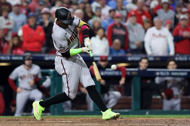 Oct 24, 2023; Philadelphia, Pennsylvania, USA; Arizona Diamondbacks shortstop Geraldo Perdomo (2) hits a single against the Philadelphia Phillies in the seventh inning for game seven of the NLCS for the 2023 MLB playoffs at Citizens Bank Park. Mandatory Credit: Bill Streicher-USA TODAY Sports