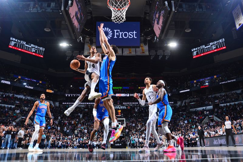 SAN ANTONIO, TX - FEBRUARY 29: Devin Vassell #24 of the San Antonio Spurs shoots the ball during the game against the Oklahoma City Thunder on February 29, 2024 at the Frost Bank Center in San Antonio, Texas. NOTE TO USER: User expressly acknowledges and agrees that, by downloading and or using this photograph, user is consenting to the terms and conditions of the Getty Images License Agreement. Mandatory Copyright Notice: Copyright 2024 NBAE (Photos by Michael Gonzales/NBAE via Getty Images)