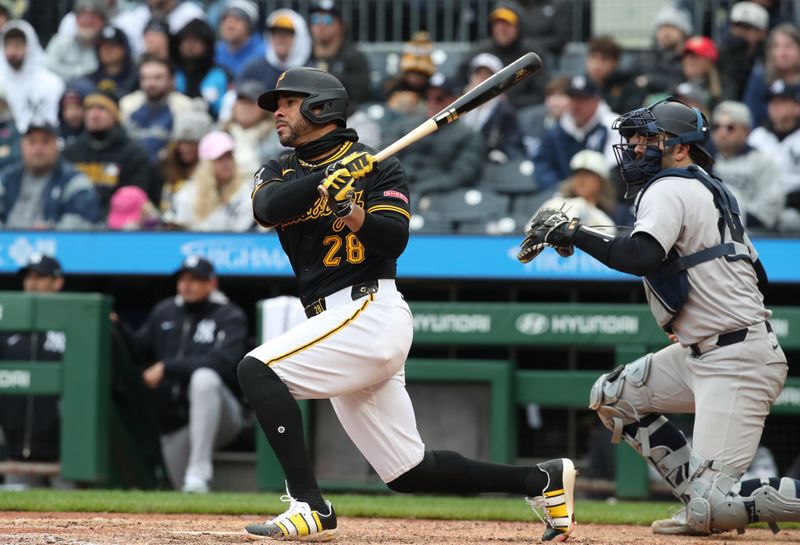 Apr 6, 2025; Pittsburgh, Pennsylvania, USA;  Pittsburgh Pirates left fielder Tommy Pham (28) hits a game winning RBI single to defeat the New York Yankees in the eleventh inning at PNC Park. Mandatory Credit: Charles LeClaire-Imagn Images