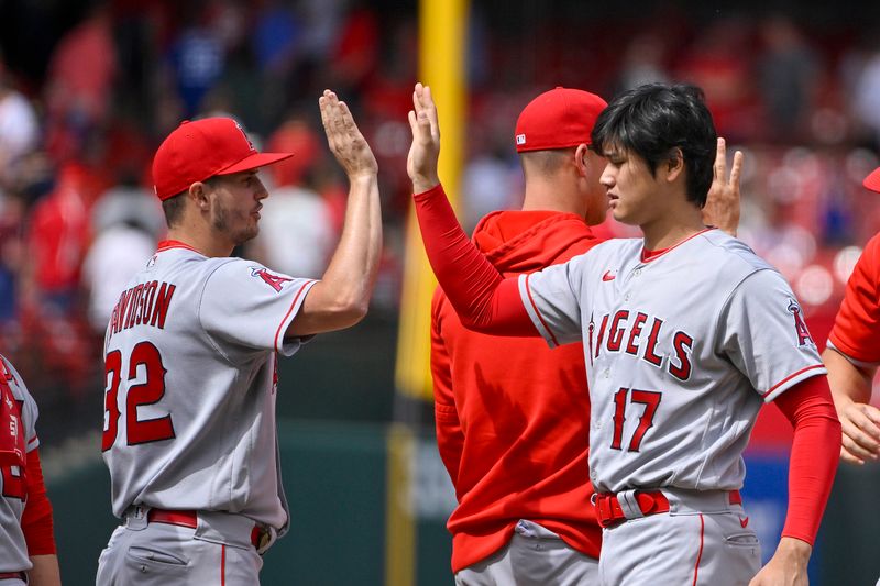 May 4, 2023; St. Louis, Missouri, USA;  Los Angeles Angels designated hitter Shohei Ohtani (17) and relief pitcher Tucker Davidson (32) celebrate after the Angels defeated the St. Louis Cardinals at Busch Stadium. Mandatory Credit: Jeff Curry-USA TODAY Sports