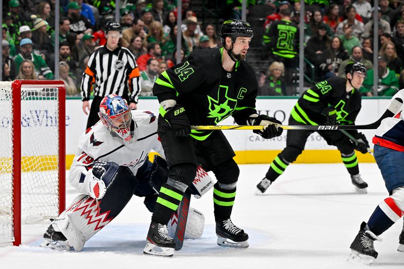 Jan 27, 2024; Dallas, Texas, USA; Dallas Stars left wing Jamie Benn (14) screens Washington Capitals goaltender Charlie Lindgren (79) during the second period at the American Airlines Center. Mandatory Credit: Jerome Miron-USA TODAY Sports