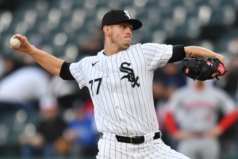 Apr 12, 2024; Chicago, Illinois, USA; Chicago White Sox starting pitcher Chris Flexen (77) pitches during the first inning against the Cincinnati Reds at Guaranteed Rate Field. Mandatory Credit: Patrick Gorski-USA TODAY Sports
