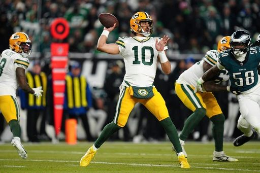 Green Bay Packers quarterback Jordan Love (10) looks to pass during the first half of an NFL wild-card playoff football game against the Philadelphia Eagles on Sunday, Jan. 12, 2025, in Philadelphia. (AP Photo/Derik Hamilton)