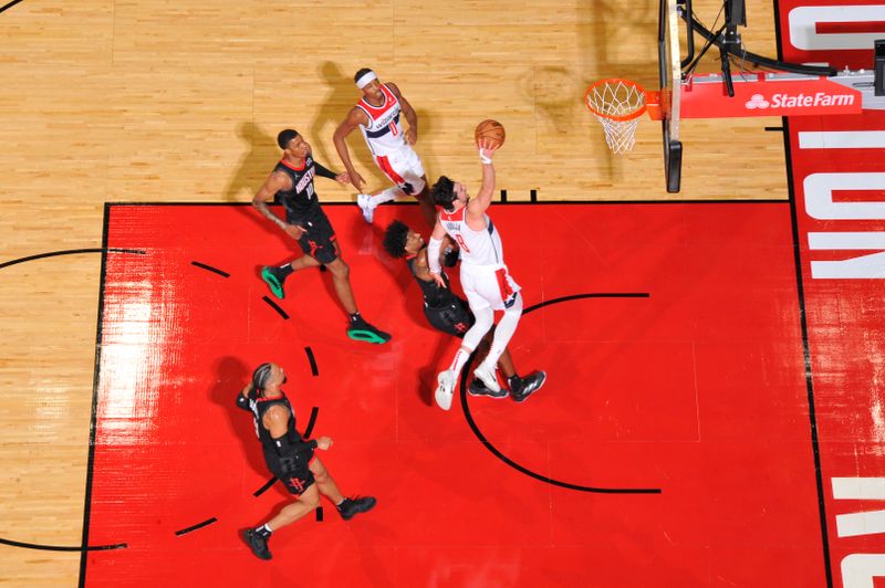 HOUSTON, TX - MARCH 14: Deni Avdija #8 of the Washington Wizards drives to the basket during the game against the Houston Rockets on March 14, 2024 at the Toyota Center in Houston, Texas. NOTE TO USER: User expressly acknowledges and agrees that, by downloading and or using this photograph, User is consenting to the terms and conditions of the Getty Images License Agreement. Mandatory Copyright Notice: Copyright 2024 NBAE (Photo by Logan Riely/NBAE via Getty Images)