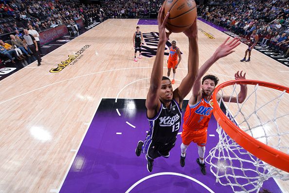 SACRAMENTO, CA - DECEMBER 14: Keegan Murray #13 of the Sacramento Kings dunks the ball during the game against the Oklahoma City Thunder on December 14, 2023 at Golden 1 Center in Sacramento, California. NOTE TO USER: User expressly acknowledges and agrees that, by downloading and or using this Photograph, user is consenting to the terms and conditions of the Getty Images License Agreement. Mandatory Copyright Notice: Copyright 2023 NBAE (Photo by Rocky Widner/NBAE via Getty Images)