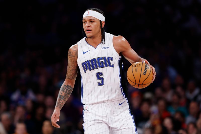 NEW YORK, NEW YORK - MARCH 08: Paolo Banchero #5 of the Orlando Magic dribbles during the first half against the New York Knicks at Madison Square Garden on March 08, 2024 in New York City. NOTE TO USER: User expressly acknowledges and agrees that, by downloading and or using this photograph, User is consenting to the terms and conditions of the Getty Images License Agreement. (Photo by Sarah Stier/Getty Images)