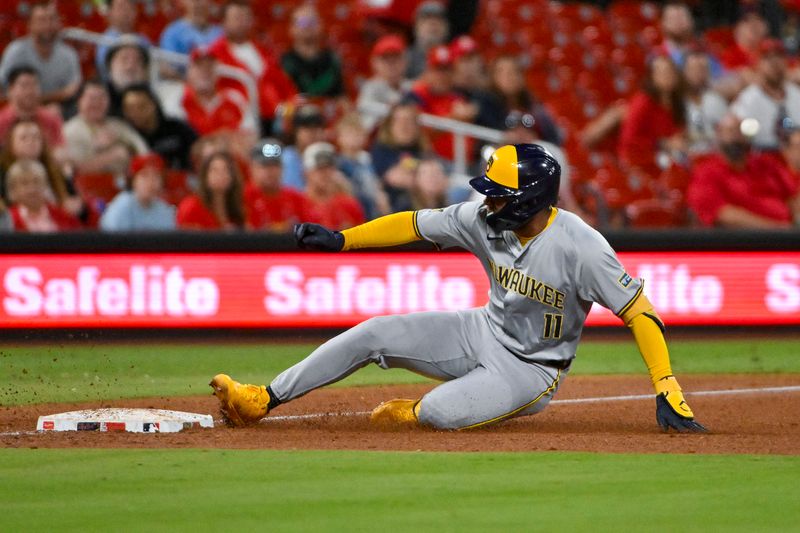 Aug 21, 2024; St. Louis, Missouri, USA;  Milwaukee Brewers left fielder Jackson Chourio (11) slides safely in at third base during the sixth inning against the St. Louis Cardinals at Busch Stadium. Mandatory Credit: Jeff Curry-USA TODAY Sports