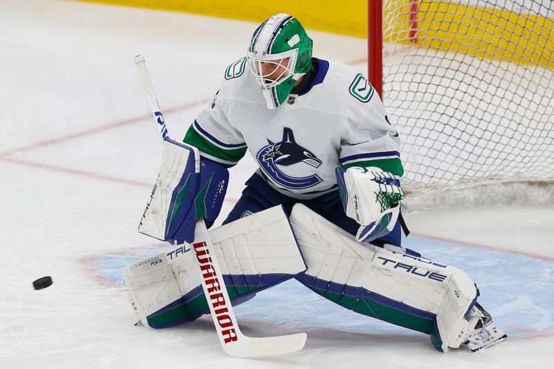 Oct 14, 2023; Edmonton, Alberta, CAN; Vancouver Canucks goaltender Casey DeSmith (29) makes a save during warmup against the Edmonton Oilers at Rogers Place. Mandatory Credit: Perry Nelson-USA TODAY Sports