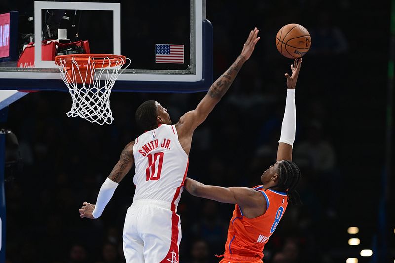 OKLAHOMA CITY, OKLAHOMA - FEBRUARY 27: Jalen Williams #8 of the Oklahoma City Thunder attempts a shot over Jabari Smith Jr. #10 of the Houston Rockets during the first half at Paycom Center on February 27, 2024 in Oklahoma City, Oklahoma. NOTE TO USER: User expressly acknowledges and agrees that, by downloading and or using this Photograph, user is consenting to the terms and conditions of the Getty Images License Agreement. (Photo by Joshua Gateley/Getty Images)