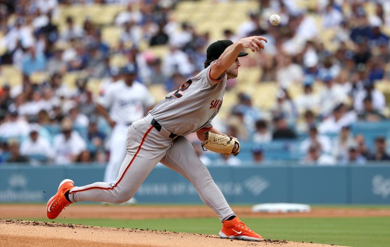 Sep 21, 2025; Los Angeles, California, USA; San Francisco Giants pitcher Trevor McDonald (72) pitches in the first inning against the Los Angeles Dodgers at Dodger Stadium. Mandatory Credit: Kiyoshi Mio-Imagn Images