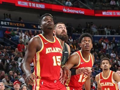 NEW ORLEANS, LA - NOVEMBER 4: Clint Capela #15 and De'Andre Hunter #12 of the Atlanta Hawks box out during the game against the New Orleans Pelicans on November 4, 2023 at the Smoothie King Center in New Orleans, Louisiana. NOTE TO USER: User expressly acknowledges and agrees that, by downloading and or using this Photograph, user is consenting to the terms and conditions of the Getty Images License Agreement. Mandatory Copyright Notice: Copyright 2023 NBAE (Photo by Layne Murdoch Jr./NBAE via Getty Images)