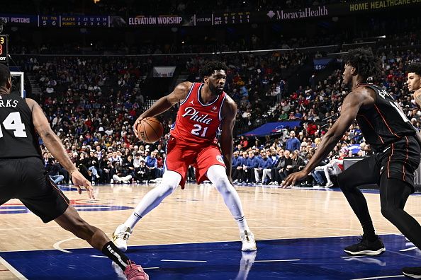 PHILADELPHIA, PA - DECEMBER 15: Joel Embiid #21 of the Philadelphia 76ers dribbles the ball during the game against the Detroit Pistons on December 15, 2023 at the Wells Fargo Center in Philadelphia, Pennsylvania NOTE TO USER: User expressly acknowledges and agrees that, by downloading and/or using this Photograph, user is consenting to the terms and conditions of the Getty Images License Agreement. Mandatory Copyright Notice: Copyright 2023 NBAE (Photo by David Dow/NBAE via Getty Images)