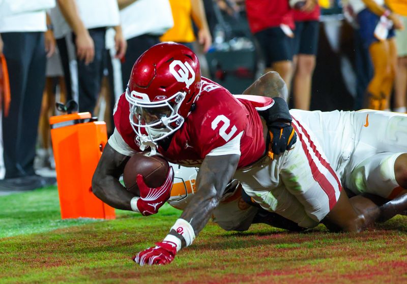 Sep 21, 2024; Norman, Oklahoma, USA;  Oklahoma Sooners running back Jovantae Barnes (2) scores a touchdown during the second half against the Tennessee Volunteers at Gaylord Family-Oklahoma Memorial Stadium. Mandatory Credit: Kevin Jairaj-Imagn Images