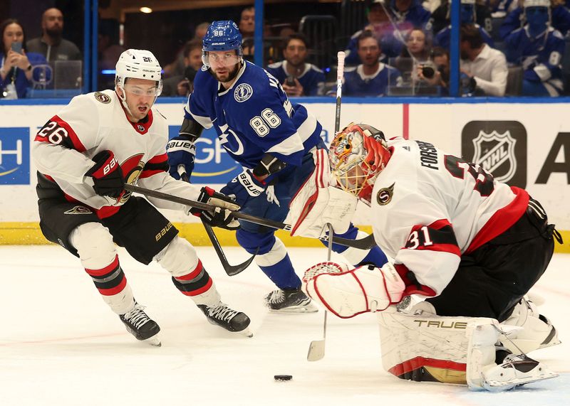 Apr 11, 2024; Tampa, Florida, USA; Tampa Bay Lightning right wing Nikita Kucherov (86) shoots as Ottawa Senators goaltender Anton Forsberg (31) makes a save during the third period at Amalie Arena. Mandatory Credit: Kim Klement Neitzel-USA TODAY Sports