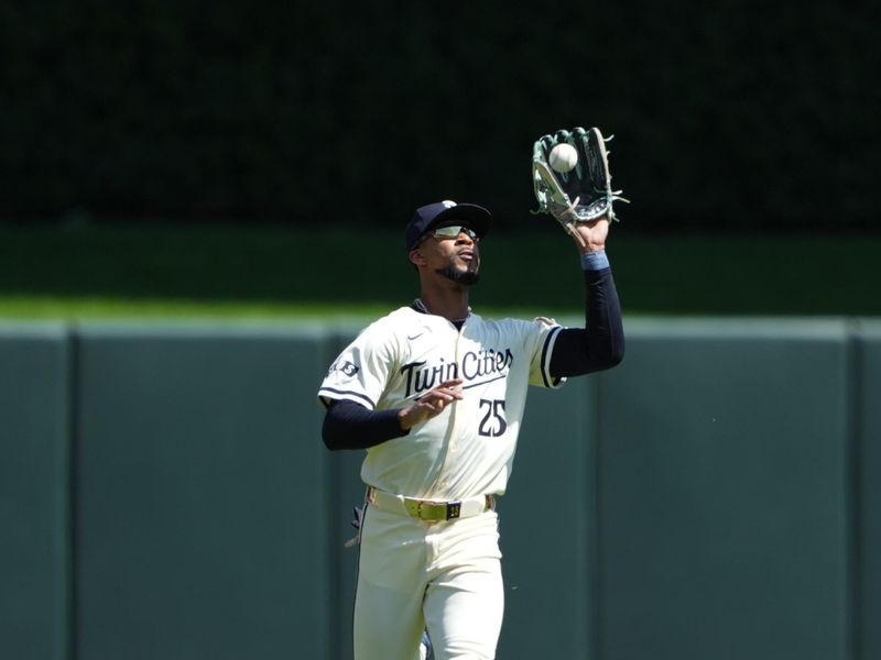 Aug 11, 2024; Minneapolis, Minnesota, USA; Minnesota Twins center fielder Byron Buxton (25) makes the catch for the out during the fifth inning against the Cleveland Guardians at Target Field. Mandatory Credit: Jordan Johnson-USA TODAY Sports