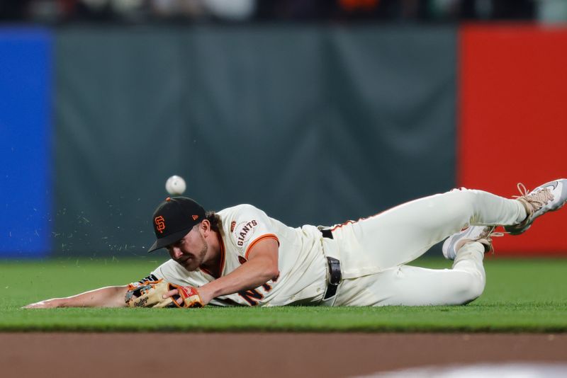 Aug 12, 2024; San Francisco, California, USA; San Francisco Giants shortstop Brett Wisely (0) can’t make a play during the eighth inning against the Atlanta Braves at Oracle Park. Mandatory Credit: Sergio Estrada-USA TODAY Sports