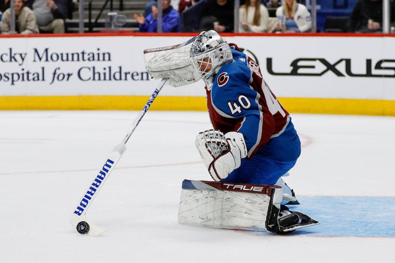 Mar 22, 2024; Denver, Colorado, USA; Colorado Avalanche goaltender Alexandar Georgiev (40) deflects the puck in the first period against the Columbus Blue Jackets at Ball Arena. Mandatory Credit: Isaiah J. Downing-USA TODAY Sports