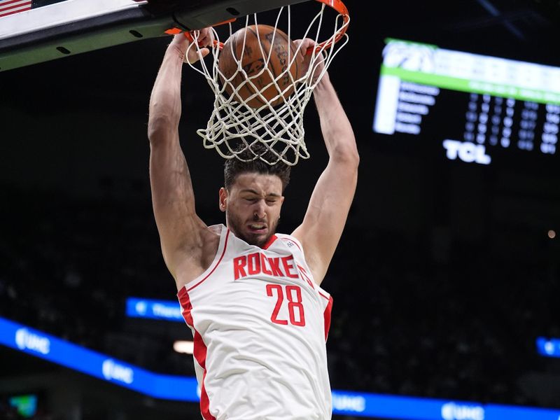 MINNEAPOLIS, MN -  NOVEMBER 26: Alperen Sengun #28 of the Houston Rockets dunks the ball during the game against the Minnesota Timberwolves during the Emirates NBA Cup game on November 26, 2024 at Target Center in Minneapolis, Minnesota. NOTE TO USER: User expressly acknowledges and agrees that, by downloading and or using this Photograph, user is consenting to the terms and conditions of the Getty Images License Agreement. Mandatory Copyright Notice: Copyright 2024 NBAE (Photo by Jordan Johnson/NBAE via Getty Images)