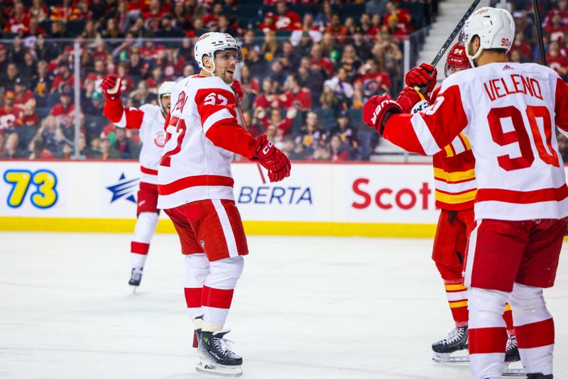 Feb 17, 2024; Calgary, Alberta, CAN; Detroit Red Wings left wing David Perron (57) celebrates his goal with teammates against the Calgary Flames during the second period at Scotiabank Saddledome. Mandatory Credit: Sergei Belski-USA TODAY Sports