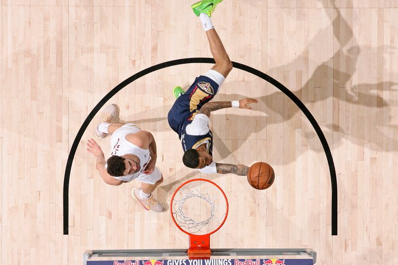 NEW ORLEANS, LA - MARCH 13: Jordan Hawkins #24 of the New Orleans Pelicans drives to the basket during the game against the Cleveland Cavaliers on March 13, 2024 at the Smoothie King Center in New Orleans, Louisiana. NOTE TO USER: User expressly acknowledges and agrees that, by downloading and or using this Photograph, user is consenting to the terms and conditions of the Getty Images License Agreement. Mandatory Copyright Notice: Copyright 2024 NBAE (Photo by Layne Murdoch Jr./NBAE via Getty Images)