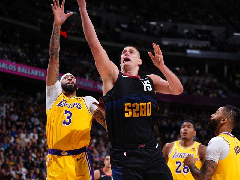 DENVER, CO - APRRIL 22: Nikola Jokic #15 of the Denver Nuggets drives to the basket during the game against the Los Angeles Lakers during Round 1 Game 2 of the 2024 NBA Playoffs on April 22, 2024 at the Ball Arena in Denver, Colorado. NOTE TO USER: User expressly acknowledges and agrees that, by downloading and/or using this Photograph, user is consenting to the terms and conditions of the Getty Images License Agreement. Mandatory Copyright Notice: Copyright 2024 NBAE (Photo by Garrett Ellwood/NBAE via Getty Images)