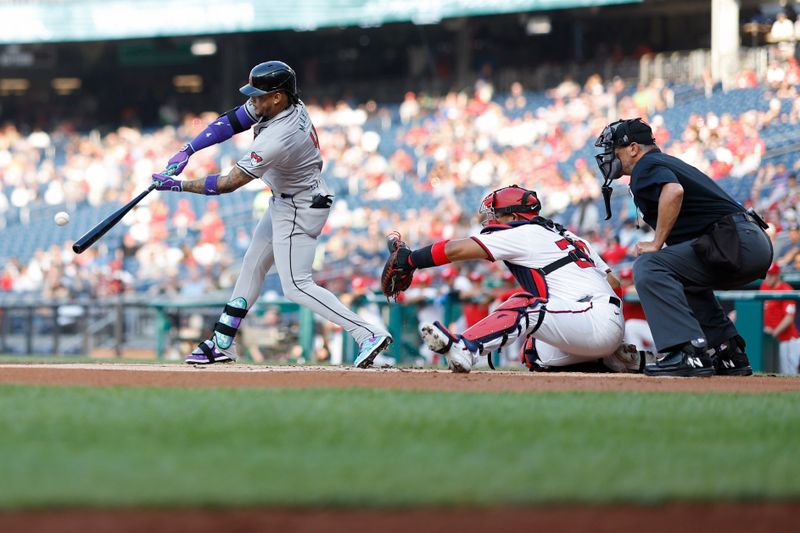 Jun 18, 2024; Washington, District of Columbia, USA; Arizona Diamondbacks second base Ketel Marte (4) hits a two run home run against the Washington Nationals during the first inning during the first inning at Nationals Park. Mandatory Credit: Geoff Burke-USA TODAY Sports