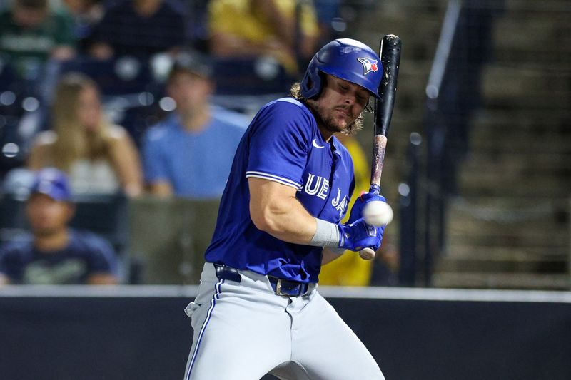 Sep 17, 2025; Tampa, Florida, USA; Toronto Blue Jays right fielder Addison Barger (47) takes a ball inside against the Tampa Bay Rays in the seventh inning at George M. Steinbrenner Field. Mandatory Credit: Nathan Ray Seebeck-Imagn Images
