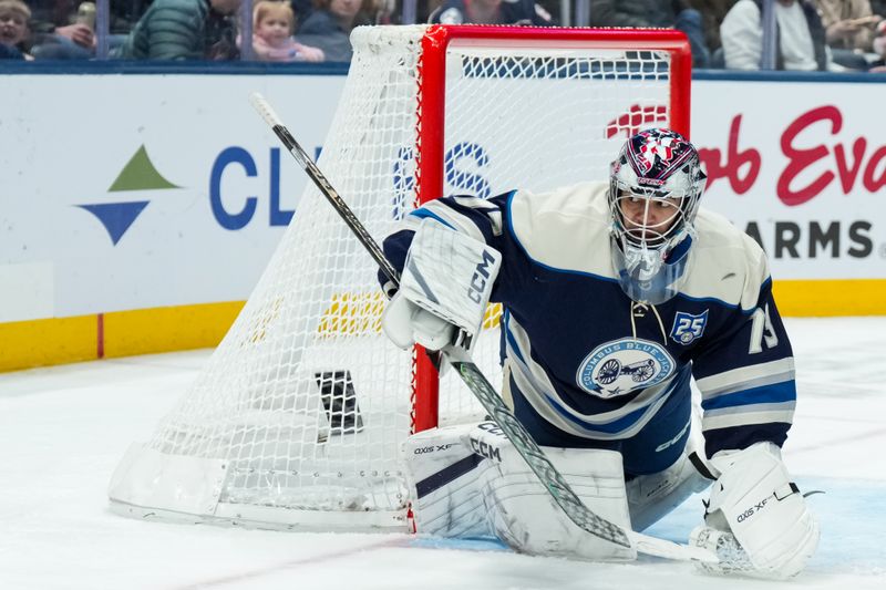 Jan 4, 2026; Columbus, Ohio, USA;  Columbus Blue Jackets goaltender Jet Greaves (73) follows the puck in play against the Pittsburgh Penguins in the second period at Nationwide Arena. Mandatory Credit: Aaron Doster-Imagn Images