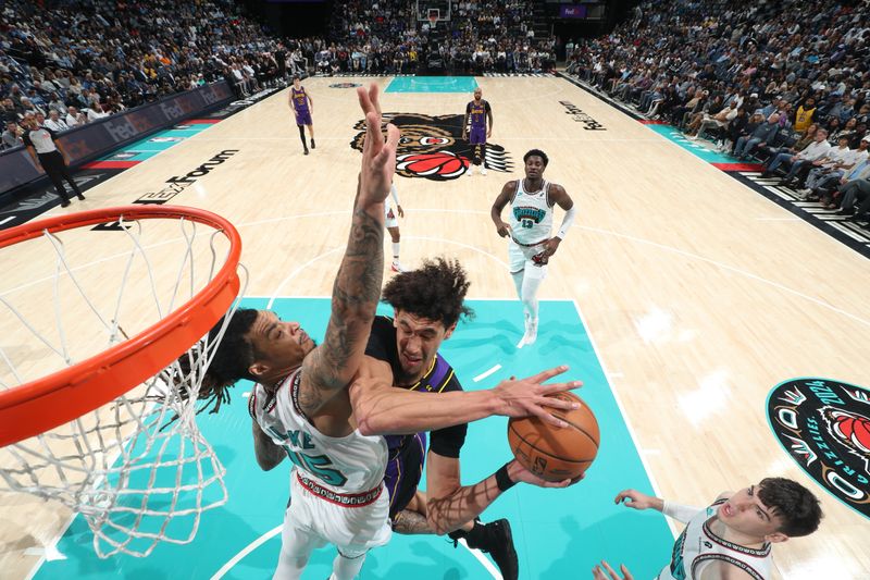 MEMPHIS, TN - NOVEMBER 6: Jaxson Hayes #11 of the Los Angeles Lakers drives to the basket during the game against the Memphis Grizzlies on November 6, 2024 at FedExForum in Memphis, Tennessee. NOTE TO USER: User expressly acknowledges and agrees that, by downloading and or using this photograph, User is consenting to the terms and conditions of the Getty Images License Agreement. Mandatory Copyright Notice: Copyright 2024 NBAE (Photo by Joe Murphy/NBAE via Getty Images)