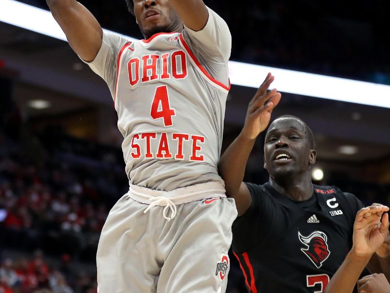 Jan 3, 2024; Columbus, Ohio, USA; Ohio State Buckeyes guard Dale Bonner (4) rebounds the ball in front of Rutgers Scarlet Knights forward Mawot Mag (3) during the first half at Value City Arena. Mandatory Credit: Joseph Maiorana-USA TODAY Sports