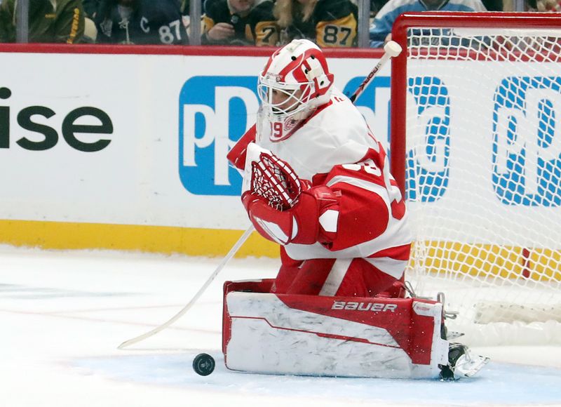 Nov 13, 2024; Pittsburgh, Pennsylvania, USA;  Detroit Red Wings goaltender Cam Talbot (39) makes a save against the Pittsburgh Penguins during the first period at PPG Paints Arena. Mandatory Credit: Charles LeClaire-Imagn Images