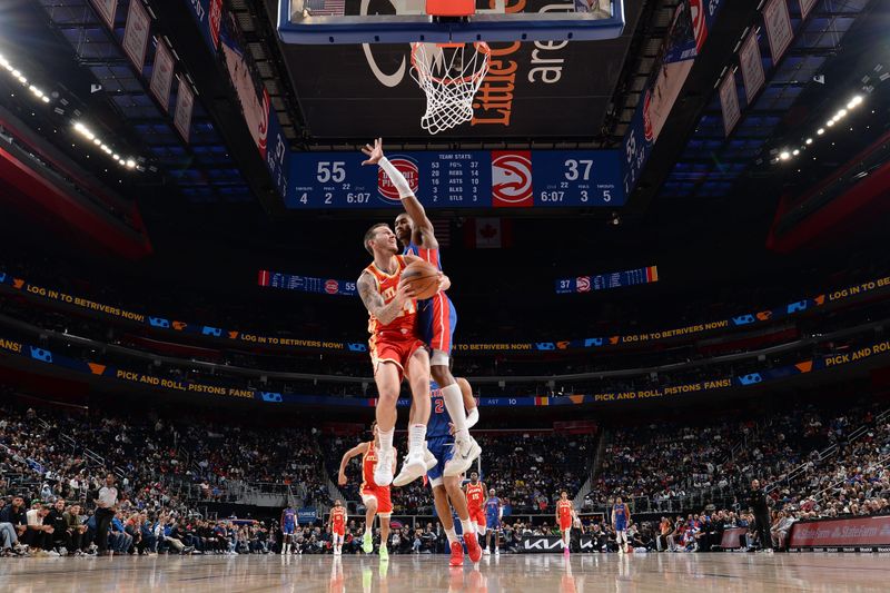 DETROIT, MI - NOVEMBER 8: Garrison Mathews #24 of the Atlanta Hawks shoots the ball during the game against the Detroit Pistons on November  8, 2024 at Little Caesars Arena in Detroit, Michigan. NOTE TO USER: User expressly acknowledges and agrees that, by downloading and/or using this photograph, User is consenting to the terms and conditions of the Getty Images License Agreement. Mandatory Copyright Notice: Copyright 2024 NBAE (Photo by Chris Schwegler/NBAE via Getty Images)